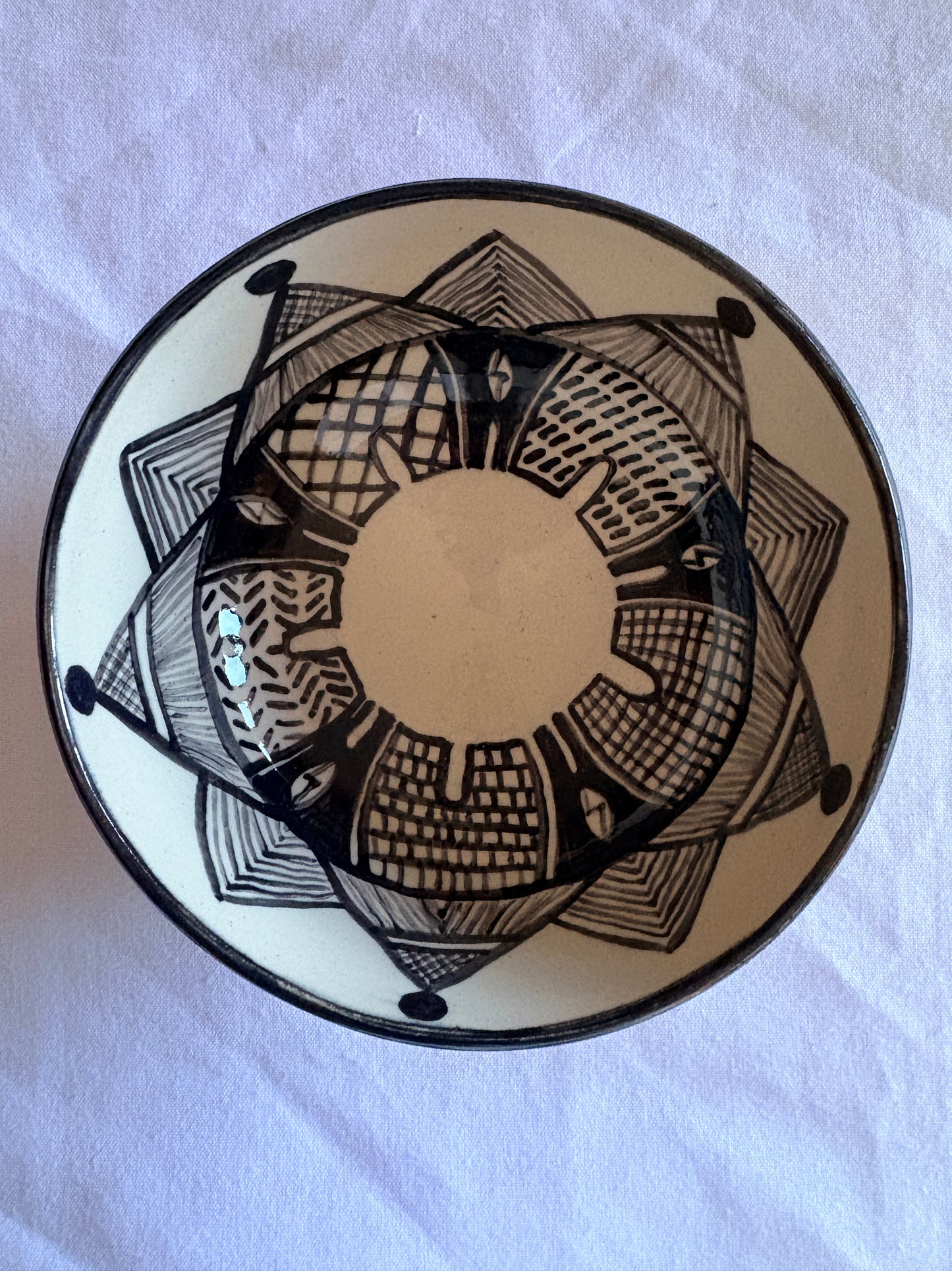 Decorative Bowl with geometric African hut pattern in black and white monochrome design